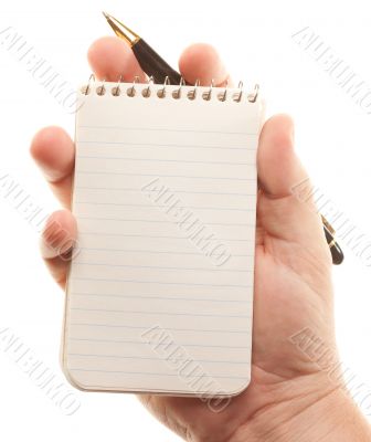 Male Hands Holding Pen and Pad of Paper