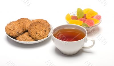 Tea, cookies and fruit candy.