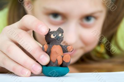 Bear stuck together from plasticine
