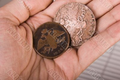 old coins in hand