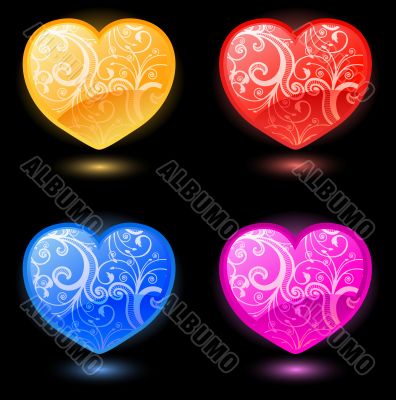Set of vector hearts on black background