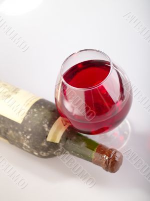 Old Red. The bottle of old red wine and glass