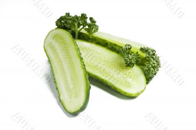 Cutted cucumbers and parsley, healthy food isolated on white