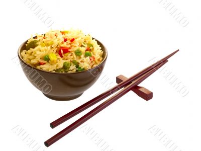 Chinese food and chopsticks. Rice with vegetables. Isolated on w