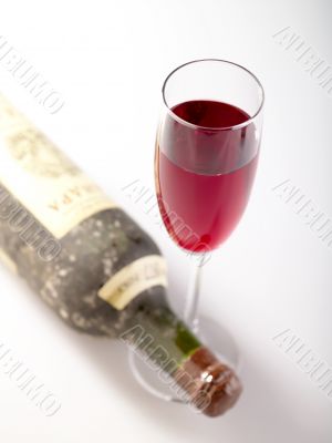 Old Red. The bottle of old red wine and glass