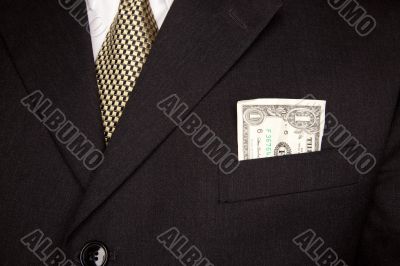 Dollar Bill in Businessman`s Coat Pocket