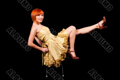 Sexy redhead in yellow dress
