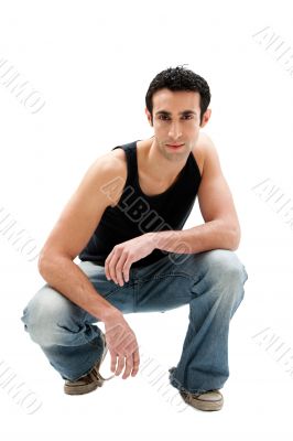 Handsome guy squatting