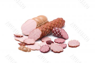 Cutting sausage on white