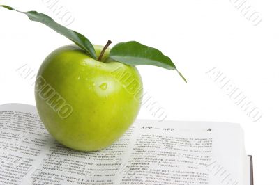Text and green apple