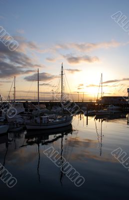 Boats on the pier at sunset