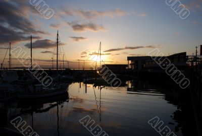Boats on the pier at sunset