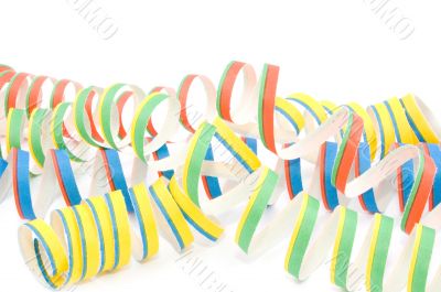 Colorful party streamers on white background