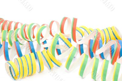 Colorful party streamers on white background