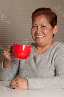 Woman having coffee