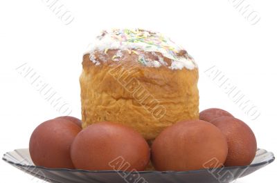 Easter sweets and eggs in plate