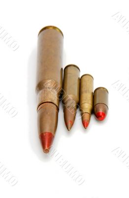 Four red-tipped tracer cartridges isolated