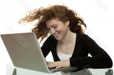 red haired teenager with laptop