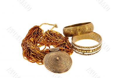two bronze bracelets and a necklace