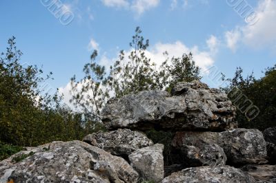 Pyramid of lichen-covered gray rocks