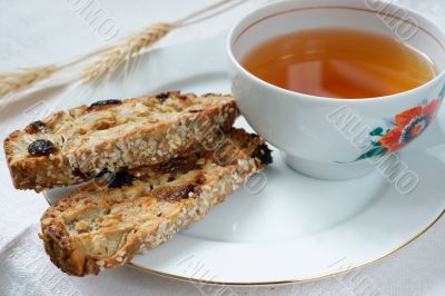 Cup of tea with biscotti cookies