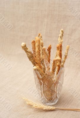 Breadsticks with seeds in vase
