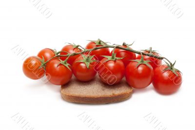 Red tomatoes cherry, pumpernickel