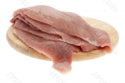 Pork on kitchen board