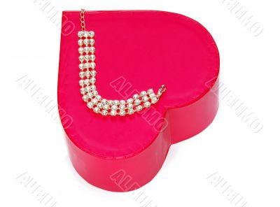 bracelet over red heart box