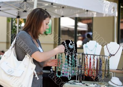 Girl buying jewelry