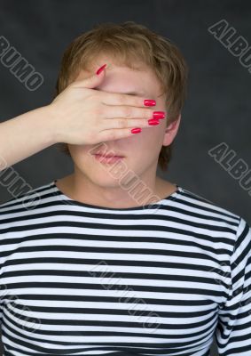 Male portrait with closed eye