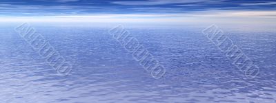 Blue cludy sky and ocean water with waves - panorama