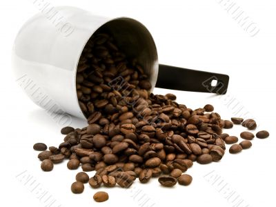 Turkish percolator with scattered coffee beans