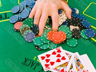 hand on stack of chips