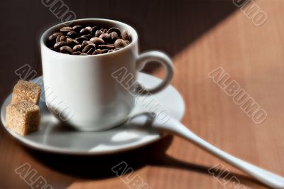 Full cup of coffee grains