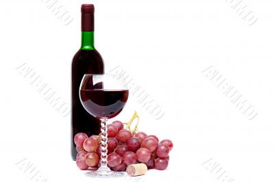 Red wine and red grapes