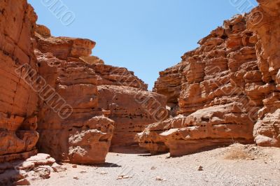 Desert landscape of weathered red rocks