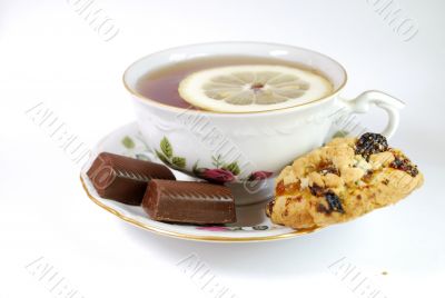 Cup of Tea with Sweet and Biscuit