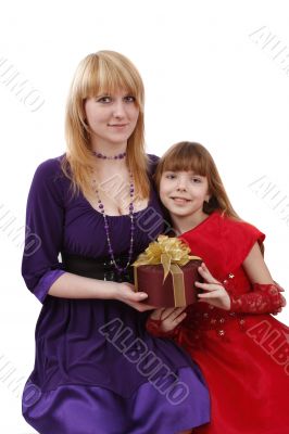 Mother and daughter with gift.