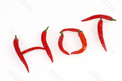 red hot chilis arranged to spell HOT