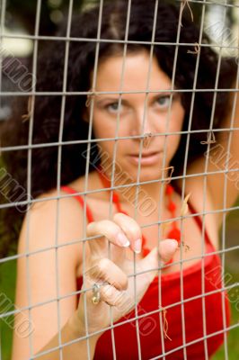 woman behind a lattice
