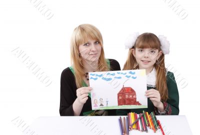 Mother and daughter are holding the picture.