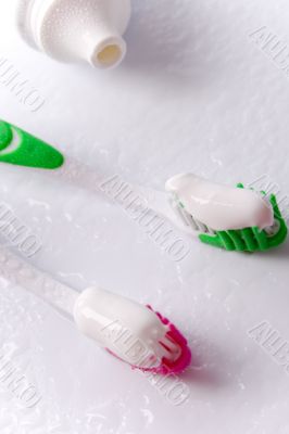 toothpaste and toothbrushes