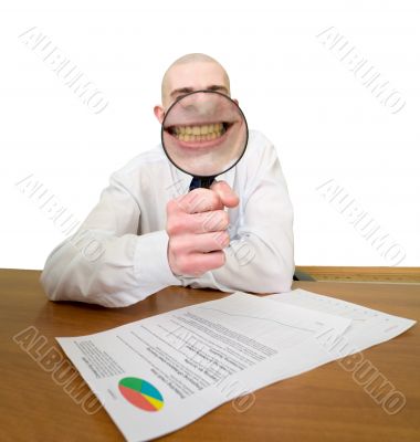 Guy looks through the big magnifier