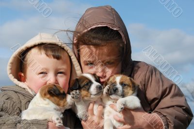 children and puppies