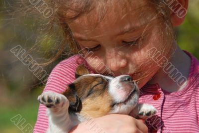 little girl and puppy