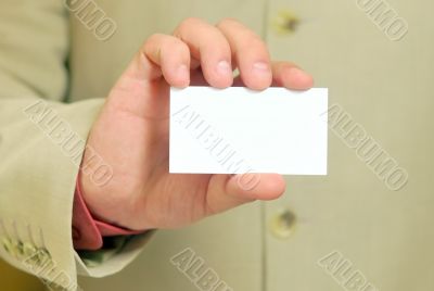 Business card in a hand