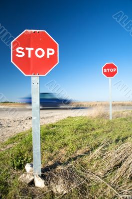 fast car with stop traffic signs