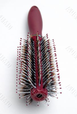 red hairbrush isolated on white background