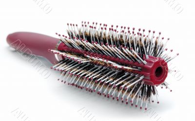 red hairbrush isolated on white background